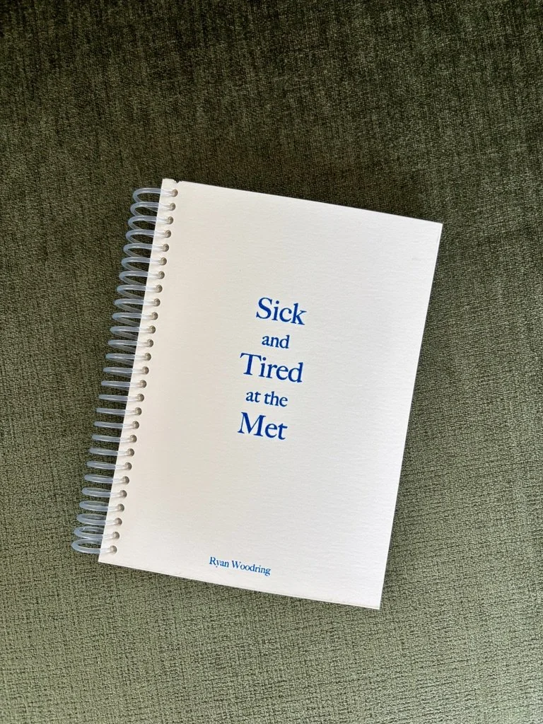 Photo of an off-white coloring book laying on a plush sap-green surface. Iridescent blue serif font reads "Sick and Tired at the Met." "Ryan Woodring" spelled out smaller below.